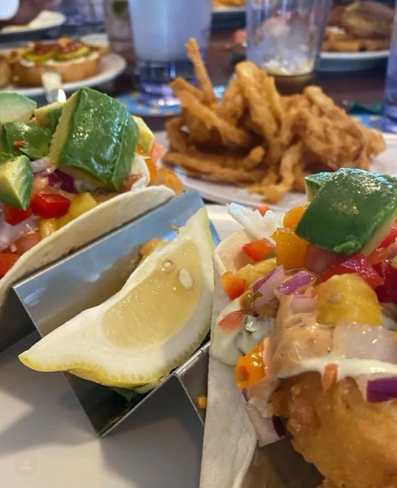 Fish tacos with avocado and pineapple salsa